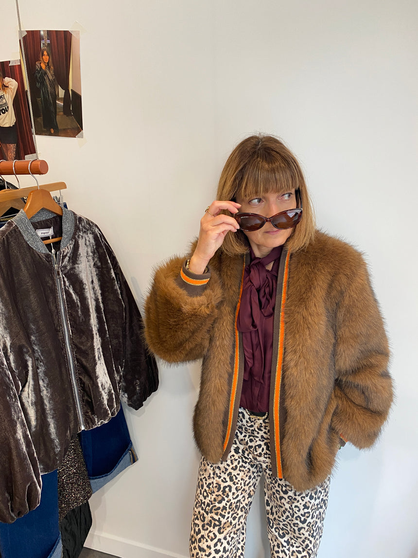 Blouson long en fausse fourrure