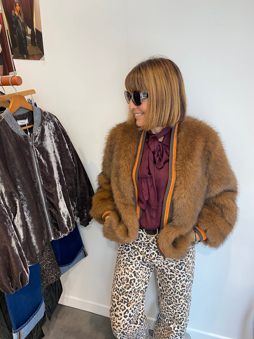 Blouson long en fausse fourrure